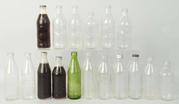 Lot of 17 Assorted 10oz. Coca-Cola 1960s Bottles.: All are embossed diamonds and one is full and from Spain. Condition (Excellent - Near Mint). Size Largest: 8" T.