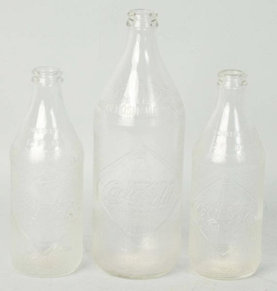 Lot of 3: Coca-Cola Diamond 1960s Bottles.: 12 and 26 oz. Condition (Near Mint). Size Largest: 9 - 1/2" T.