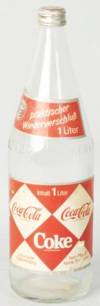 1960s European Paper Label Coca-Cola Bottle.: 1 Liter. Some stains and paper chips. Condition (Very Good Plus).