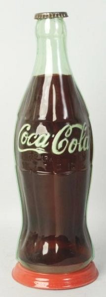 1950s Plastic Coca-Cola Display Bottle.: Cap is worn. Bottle color good, but a few holes and small breaks in plastic. Condition (Very Good). Size 19 - 1/2" T.