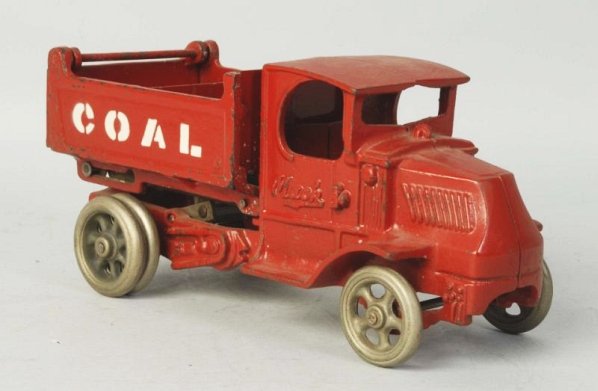 Cast Iron Arcade Coal Mack Front Dump Truck.: Marked coal on both sides of back. Original tailgate. Missing driver. Dual rear wheels. Toy has been completely repainted. Condition (Repainted). Size 10" L.