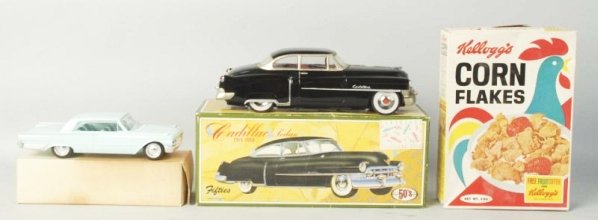 Lot of 3: Vintage & Collectible Items.: Including, Corn Flakes box with wood woodpecker stuffed toy offer on back. 1980s Japanese Cadillac Toy which is friction. Last, 1961 Ford Promo automobile model. Condition (Very Good - Excellent). Siz