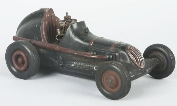 Cox Thimble Drone Champion Race Car.: Does have a motor. Marked Ray Cox Thimble Drone Champion on bottom California. Has some scratching and wear throughout. Condition (Very Good). Size 9 - 3/4" L.