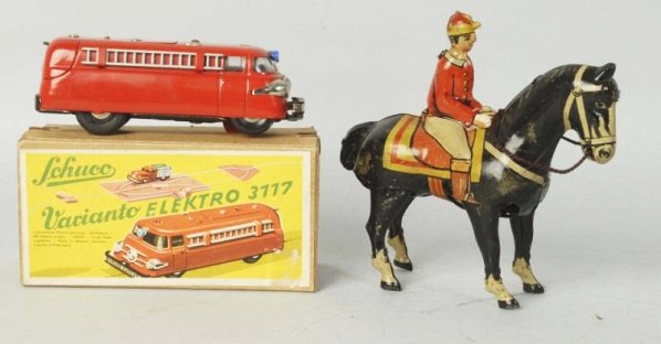 Lot of 2: German Tin Toys.: Wind-up toys. Includes Shucko Electro bus. No. 3117 in original box. Second tin lithographed jockey horse on rider. Condition (Excellent). Size Largest: 5" L.