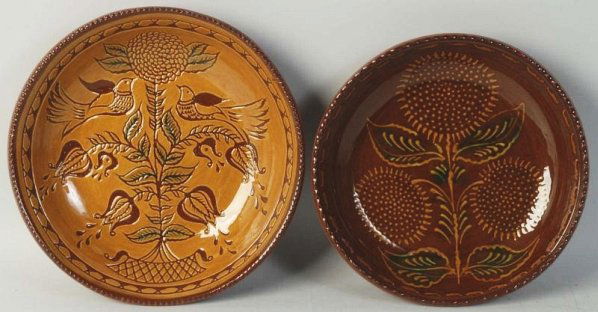 Lot of 2: Ned Foltz Redware Bowls.: Includes one with birds and flowers and second with flowers. No damage or repairs. Condition (Excellent). Size Largest: 10' Dia.