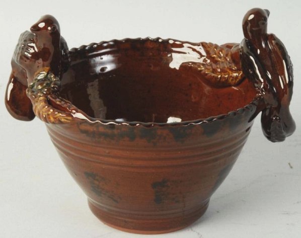 Ned Foltz Redware Pottery.: Vase with two birds on top. Condition (Excellent). Size 6 - 1/4" L.