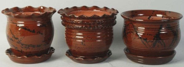 Lot of 3: Ned Foltz Redware Flower Pots.: with retaining dishes. Condition (Excellent). Size Largest: 7 - 1/2" Dia.