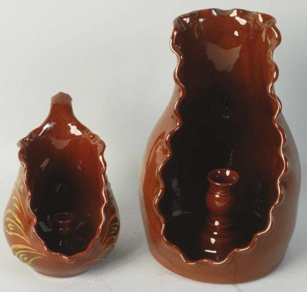 Lot of 2: Ned Foltz Redware Candle Holder .: Design shield backs and handles. No damage or repairs. Condition (Excellent). Size Largest: 9" T.