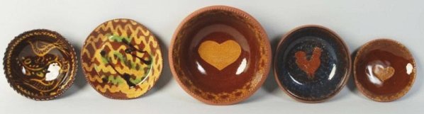 Lot of 5: Ned Foltz Redware Pottery Bowls.: Two with hearts birds, chicken and slip wear. No damage or repair. Condition (Excellent). Size Largest: 7 - 1/2" Dia.