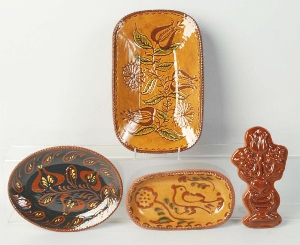 Lot of 4: Ned Foltz Redware Pottery Dishes.: Floral piece and three oval platters. Two floral. No damage or repair. Condition (Excellent). Size Largest: 10 - 3/4" L.