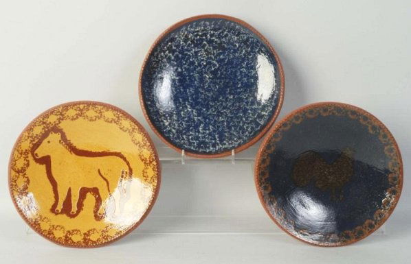 Lot of 3: Ned Foltz Redware Pottery Plates.: Two with blue decor, one with chicken and one with horse and spongeware decor. No damage or repair. Condition (Excellent). Size Each: 9 - 1/4" Dia.