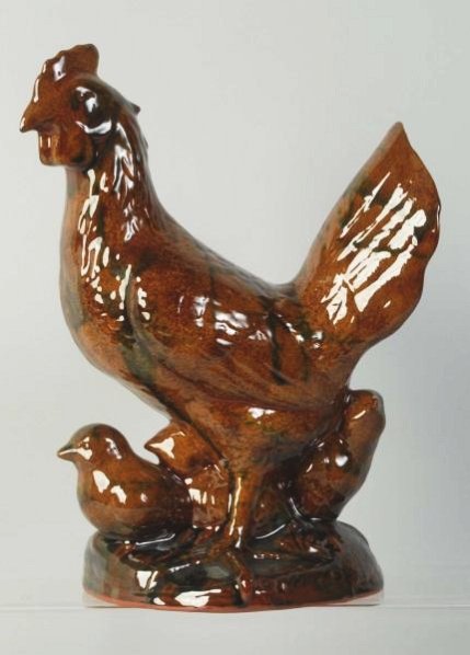 Ned Foltz Redware Pottery Chicken with Chicks.: Large chicken with peeps at bay. No damage or repair. Condition (Excellent). Size 12" T.