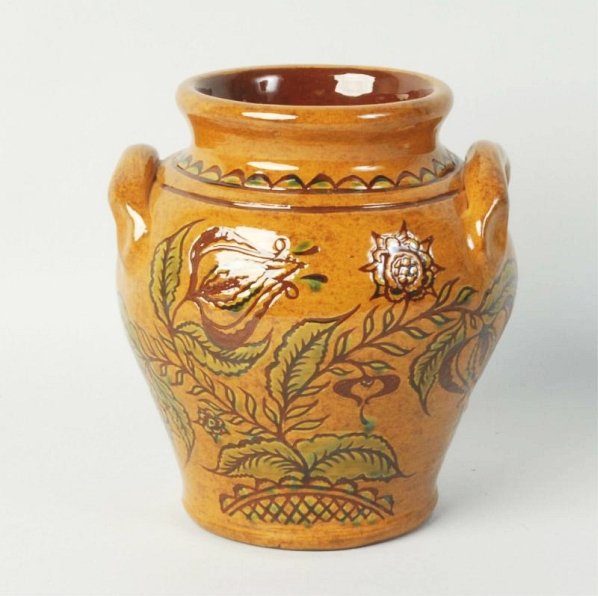 Ned Foltz Redware Pottery Vase.: Double handled jug with intricate floral motif. Condition (Excellent). Size 6 - 1/2" T.