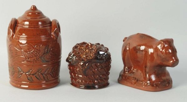 Lot of 3: Ned Foltz Redware Pottery Banks.: Bartet with flower and bees1992, double handles pot. Condition (Excellent). Size Largest: 6 - 1/2" T.