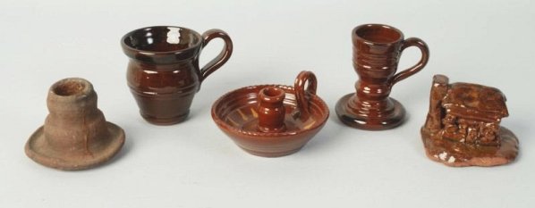 Lot of 5: Ned Foltz Redware Pottery Pieces.: Candle holder, egg cup, mug, house and non glazed candle holder. No damage or repair. Condition (Excellent). Size Largest: 4" Dia.