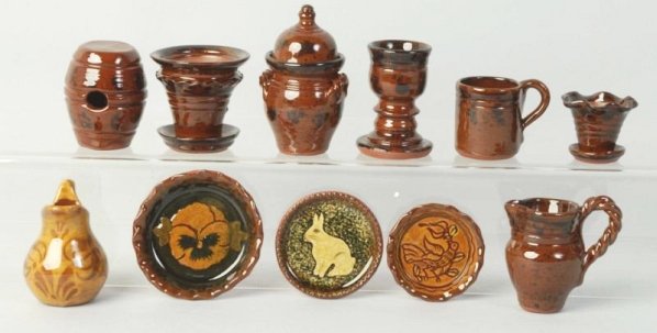 Lot of 11: Ned Foltz Redware Pottery Pieces.: Several decorated. No damage or repair. Condition (Excellent). Size Largest: 3 - 1/2" T.