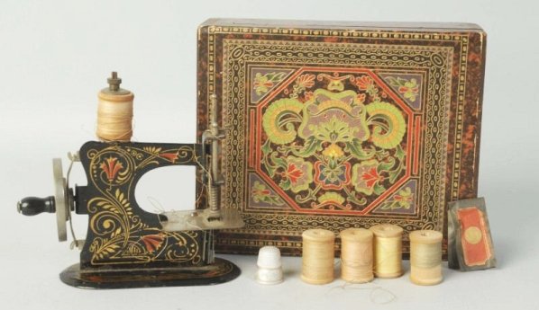 Small Sewing Machine.: In wooden box. Condition (Excellent). Size Box: 7" x 5 - 3/4".