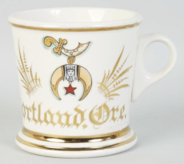 Fraternal Shaving Mug.: Semi Vitreous. Shows insignia of the shriners. No name just address Portland, Oregon. Stamped The Potters Co-op East Liverpool, Ohio Dated 11-21-1. Has minor in manufacturing stress crack where handle