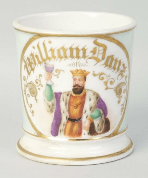 Patron Saint of Brewing Shaving Mug.: Has King Brennus toasting a glass of beer. Marked William Danz. Has very light green wrap all the way around. Has vertical crack that has been repaired and a bottom rim repair and repaint. Condition (