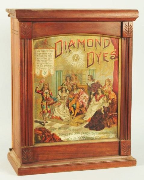 Diamond Dye Cabinet.: Depicts Gesture performing in front of men and women. Oak case, tin front. Condition (Excellent). Size 27 - 1/4" T.