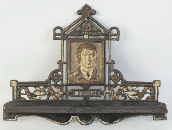 Burn’s Tobacco Advertising.: Cast iron, wall pipe hanger. Nice image in relief. Condition (Very Good). Size 13 - 1/4" L.