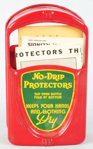 Lot of 2: 1940s No-Drip Dispensers.: The small version is new in the box and the larger version has light wear and small rust spots, with most on back. Condition (Very Good - Near Mint). Size Largest: 7 - 3/4" T.