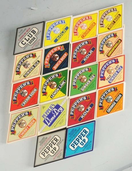 Cabinet of Asst. Pepper's Labels.: Labels are mostly 1940s-50s, with many flavors represented and lots with companion neck labels too! Approximately 5,000 labels. Condition (Excellent). Size Largest: 6" L.
