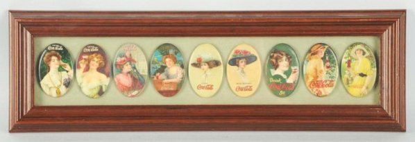 Lot of 9: Assorted Coca-Cola Pocket Mirrors.: 1906 to 1920 complete set of the more widely distributed mirrors. The set is framed under glass and displays impressively, with few visible flaws. The surfaces of the 1908 and 1914 are a bit bumpy. Th
