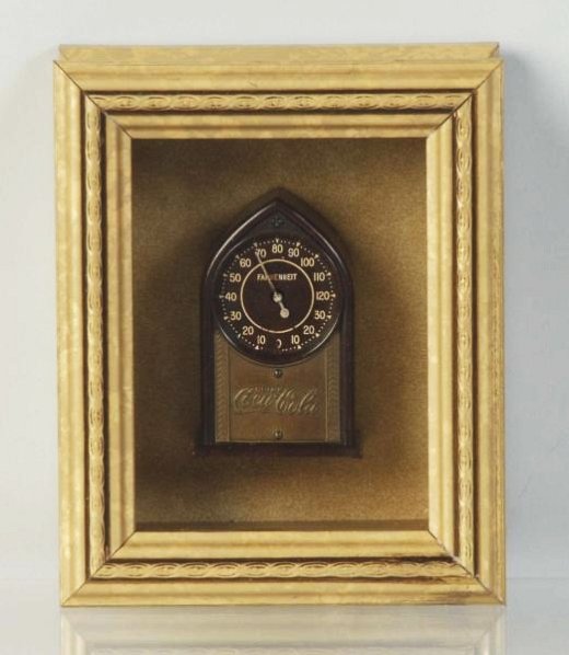 Unusual Cathedral Style Coca-Cola Desk Therm.: C. 1930s-40s and mounted in a small showcase frame. Case of piece is tortoise shell coloration in plastic or Bakelite. Readout seems accurate. Small soiled spot near zero on the dial, light wear other