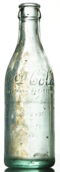 T.O. Smith & Co. Coca-Cola Bottle: Texarkana and Ashdown, AR. Bottle with a closed base crack and interior cloudiness. Condition (Very Good). Size 7 - 1/2" T.
