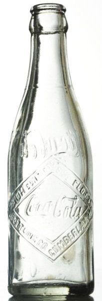 Cumberland, Maryland Clear Coca-Cola Bottle.: Embossed Diamond Label with lip nicks and three bruises down low on back of bottle. Condition (Very Good). Size 8" T.
