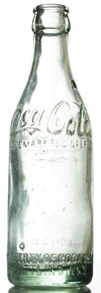 Belzoni, Mississippi Coca-Cola Bottle.: Chip in neck and logo lettering nicking and abrasions. Condition (Very Good). Size 7 - 3/4" T.