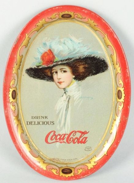 1910 Oval Tip Tray.: A few small shallow dents. Rust spot bottom center. rim nicks. Condition (Excellent). Size 6" T.