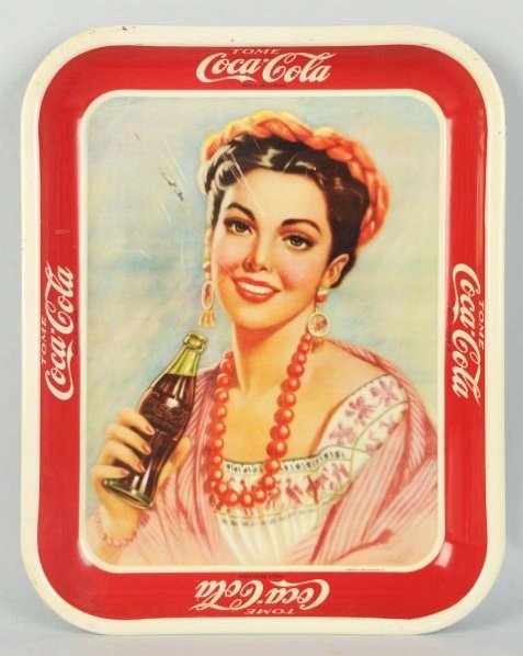 1940's Spanish Coca-Cola Serving Tray.: Clean rim and border, but some stronger scratches on the top portion of the tray face. Condition (Very Good). Size 13 - 1/4" x 10 - 1/2".