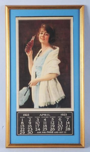1923 Coca-Cola Calendar with Bottle.: Framed under glass with metal strip and pad appears to be full from April on. Minor roll ripples are quite faint and three to four tiny dots are all that keeps the piece from near perfection! Conditio