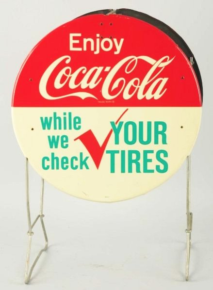 1962 Coca-Cola Tin Tire Rack Sign.: A shallow vertical bend on one side and just a few small marks on the other Condition (Near Mint). Size 32" T.