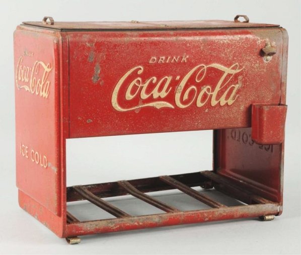 1939 Coca-Cola Salesman Sample Cooler.: Heavily worn and pitted, with a few bends and dents. Booklets inside are copies. Good restoration potential. Condition (Fair). Size 12 - 1/4" L.