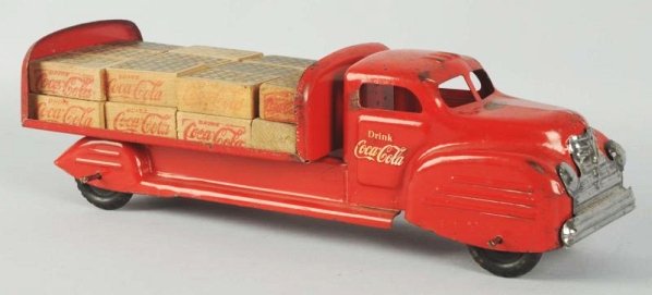 Red Lincoln Coca-Cola Truck.: 1940's With numerous original wooden cases. Overall wear in general. Condition (Very Good). Size 15 - 3/4" L.
