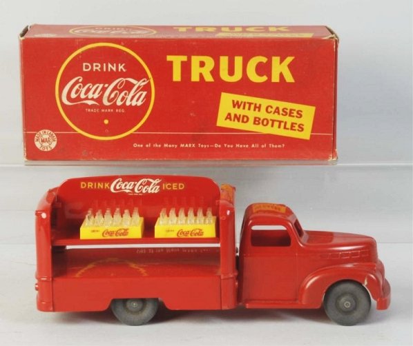 Scarce Canadian Marx Coca-Cola Toy Truck & Box.: Light-moderate soiling on box truck is great with just a tiny mark or two. If it ever had the sliding cargo doors they are missing. Condition (Near Mint). Size 10 - 1/2" L.