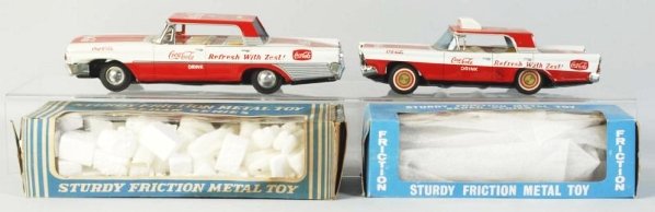 Lot of 2: 1960's Coca-Cola Friction Cars.: The Ford cab and car both have only light marks/wear. One box is stained. Condition (Near Mint). Size Largest: 10 - 3/4" L.