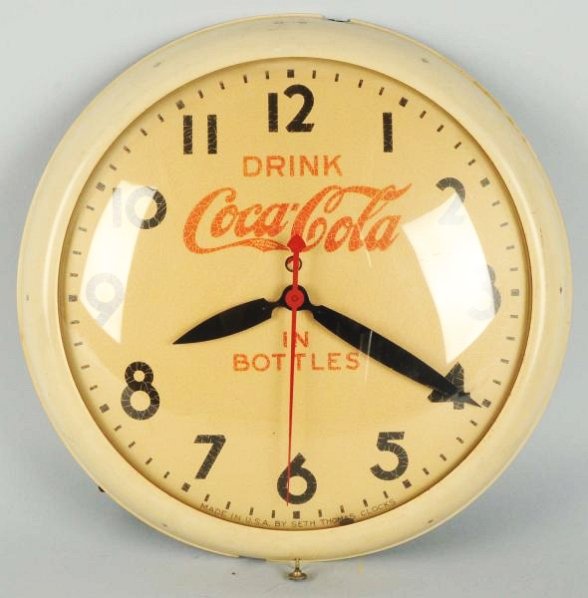 Late 30's Seth Thomas Coca-Cola Electric Clock.: Currently not running, crazing on face, light wear. Condition (Very Good). Size 15" Dia.