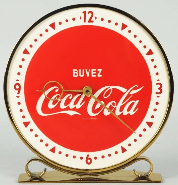 Rare 1940s-50s Coca-Cola Desk Clock.: Beautiful!! Porcelain face and brass frame and case with mild tarnish and no wear. Not often found! French Canadian. Condition (Near Mint). Size 8 - 3/4" T.
