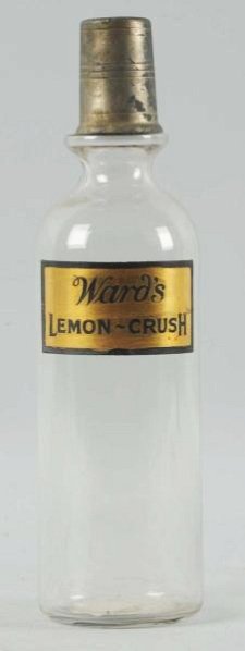 Ward's Lemon Crush Syrup Bottle.: Reverse on glass label. Condition (Excellent). Size 12 - 1/2" T.