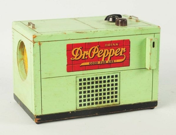 1940s Wooden Dr. Pepper Cooler Radio.: All original and complete with overall medium wear and paint nicking with light soiling. Condition (Very Good). Size 12" L.