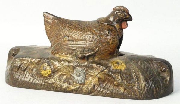 Cast Iron Hen & Chicklette Mechanical Bank.: J. & E. Stevens Company, original trap, brown hen Condition (Good - Very Good). Size 10" L.