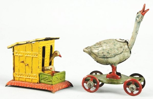 Lot of 2: Bird Theme Tin Litho Penny Toys.: German. One is a goose with a bobbing head on platform. Other one is a hen house wit two birds pecking at food trough. That one is marked GESCH on bottom. Some wear especially to roof of house. Condit