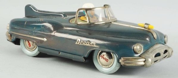 Japanese Tin Litho Friction Dream Car.: Open air version. Without bubble. Has three AAAs behind drivers head. Original tail fin and hub caps. Hood ornament and bumpers look good. Front grill looks like it might be a replacement. Some scratc