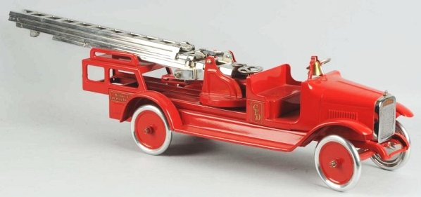 Pressed Steel Buddy L Ladder Truck.: Truck is professionally restored with new decals. Has re-chromed ladder. Condition (Very Good). Size 30" L.
