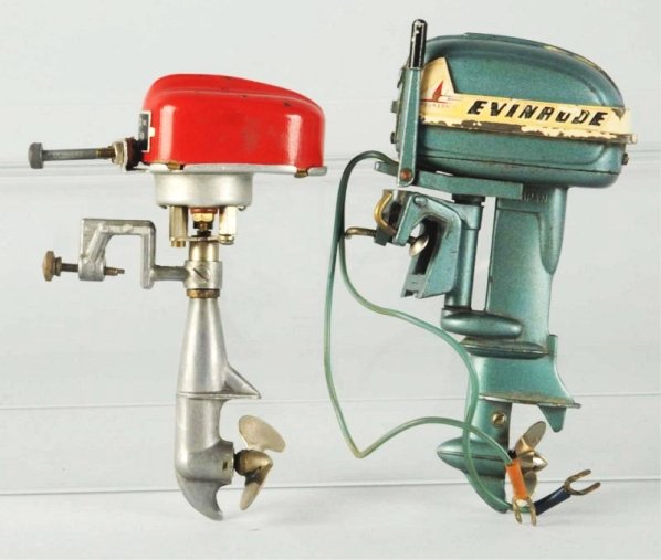 Lot of 2: Japanese Outboard Batter Op. Motors: .: One has Evinrude decals. Decals have some chipping they have some wear. Other one says D.C. Motor Sakai Seisakusho. Made in occupied Japan Condition (Very Good). Size Largest: 5 - 1/2" L.