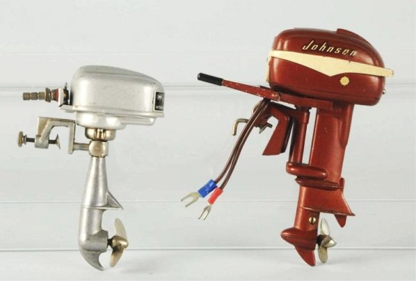 Lot of 2: Japanese Battery Op. Motors.: One is a Johnson which has nice decals on both sides. Seahorse marked Japan. Second one is marked IMP. Condition (Very Good). Size Largest: 5 - 1/2" L.
